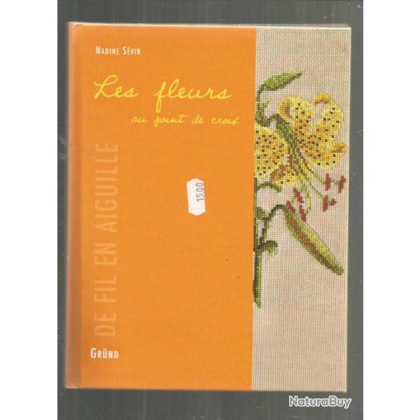 Les fleurs au point de croix. couture , plantes