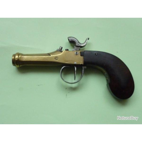 Beau petit pistolet percussion en laiton