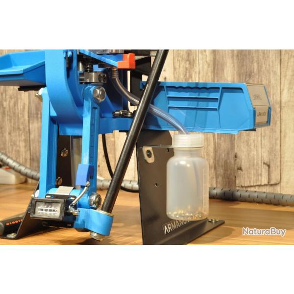 Goulotte d'amor�age pour amorces usag�es avec support et bouteille