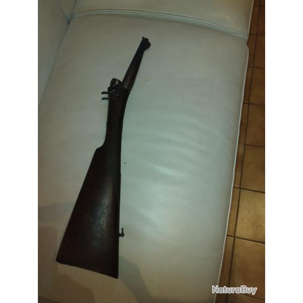 crosse avec platines de fusil a  percussion centrale