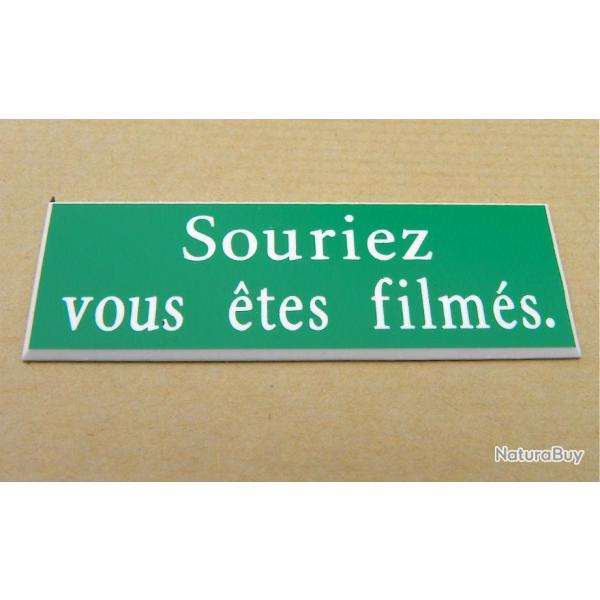 Plaque adh�sive verte "Souriez vous �tes film�s" Format 29x100 mm