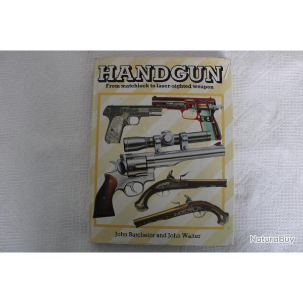 Handgun from matchlock to laser-sighted weapon