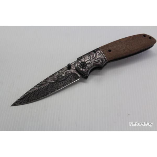 COUTEAU A OUVERTURE ASSISTEE BEL 584812