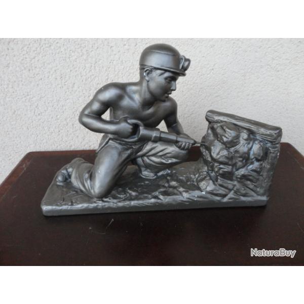 Sculpture Mineur de fond.