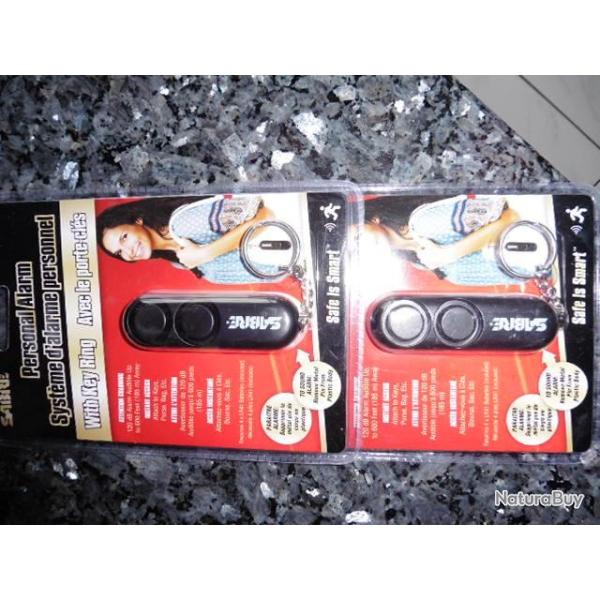 Lot de 2 alarmes personnelles neuves Sabre