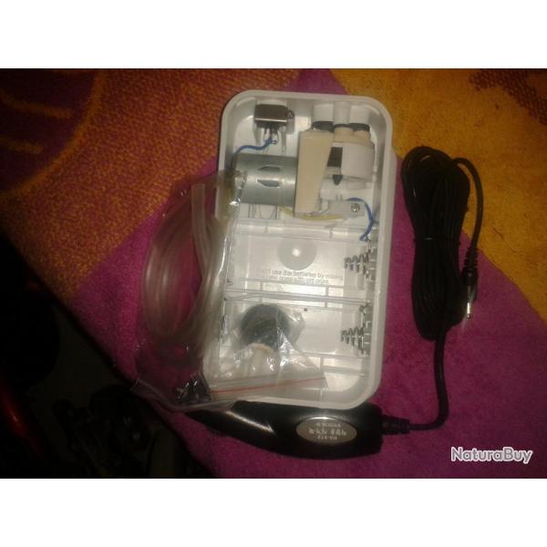 A�rateur pile/allume cigare pour le transport des vifs