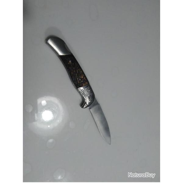 Couteau tte d'aigle avec cran de suret