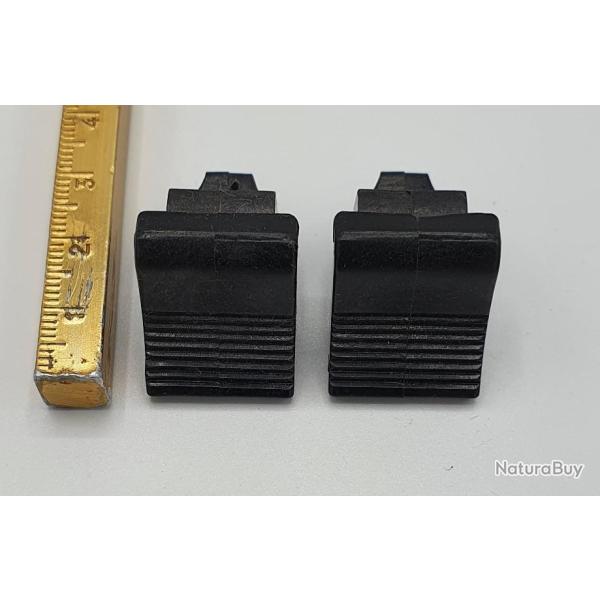 Arr�toirs de chargeur en mati�re plastique .