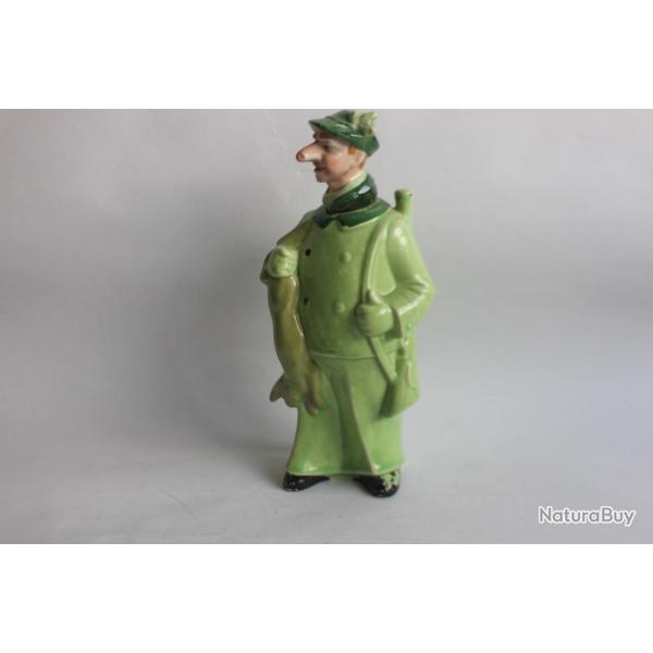 Bouteille anthropomorphe porcelaine chasseur