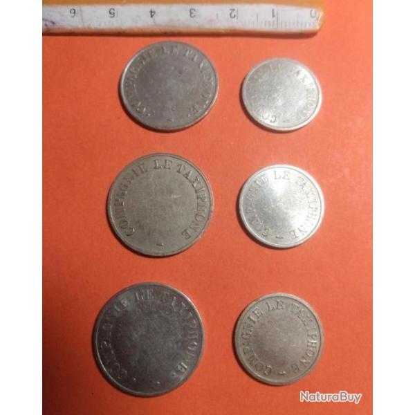 Lot de deux jetons Compagnie Le Taxiphone - diam 2,4 cm et 1,9 cm.