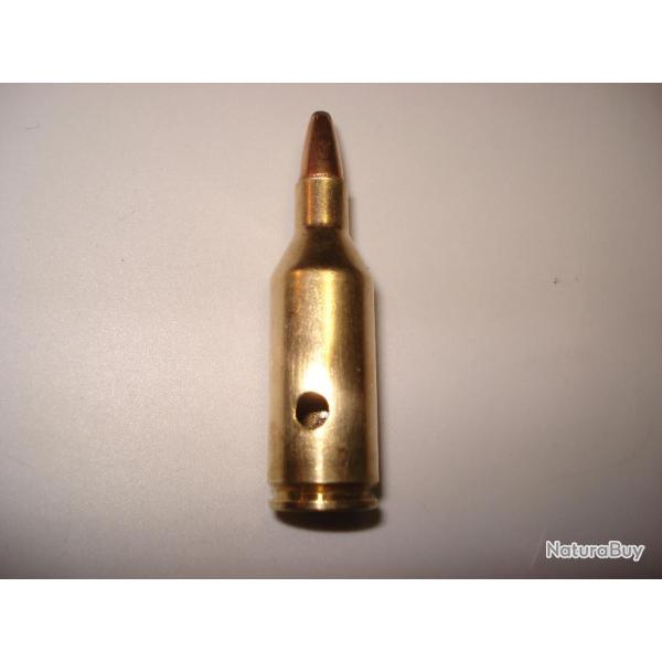 une cartouche de 243 wssm neutralis�e, amorce percut�e, �tui perc�, ogive demi blind�e