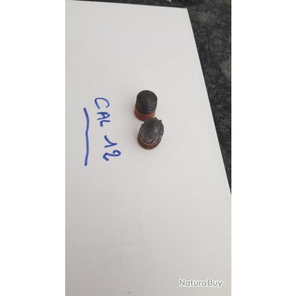 lot de 2  balles anciennes en calibre12