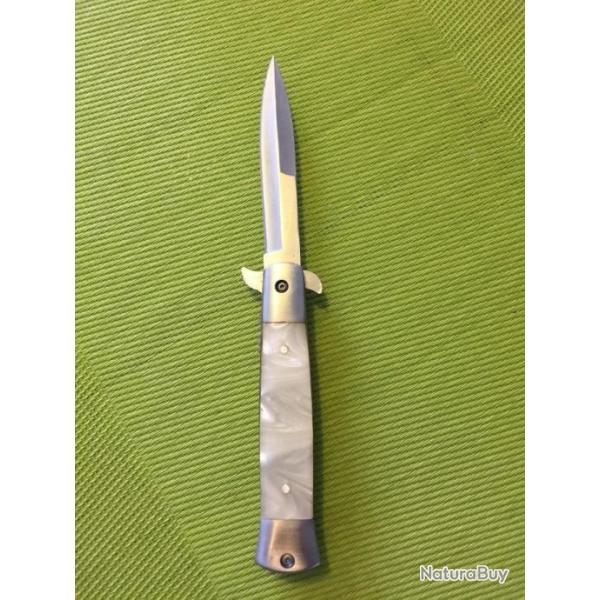 Couteau de poche ouverture assiste