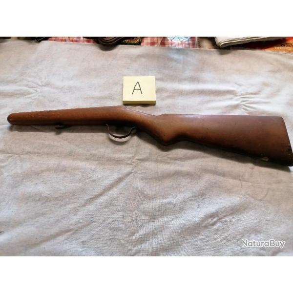 Crosse de carabine a identifier ( A )