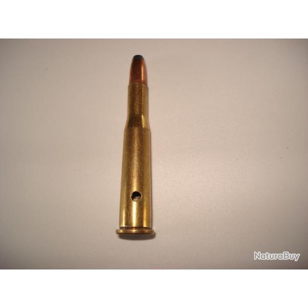 une cartouche de 25-35 winchester neutralis�e, perc�e, percut�e, ogive demi blind�e pour collection