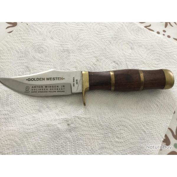 Vends ancien COUTEAUX GOLDEN western AVEC �TUI