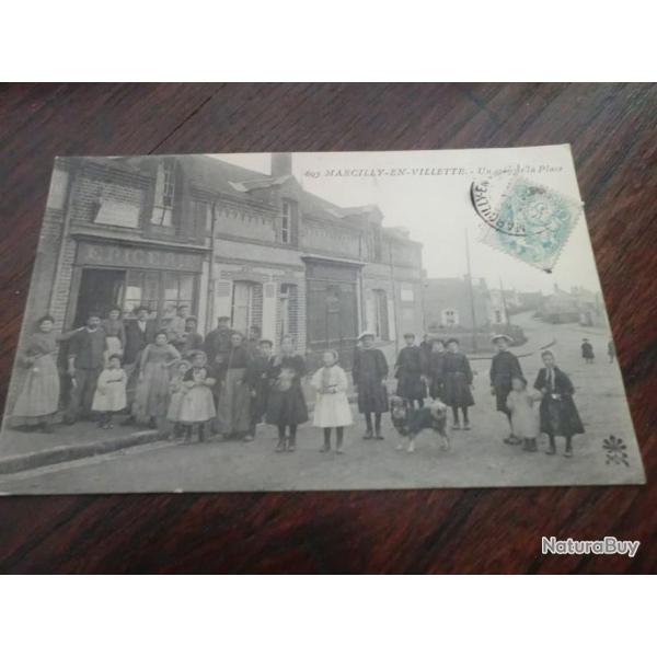 CP  dpt  45  MARCILLY  EN VILLETTE  UN COIN DE LA PLACE