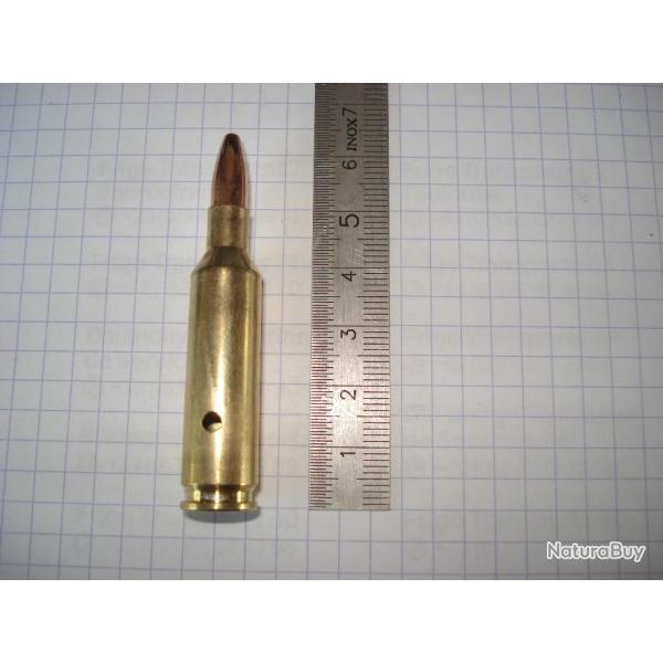 une cartouche de 6mm XC neutralis�e, perc�e, percut�e, ogive blind�e,marque Norma, pour collection