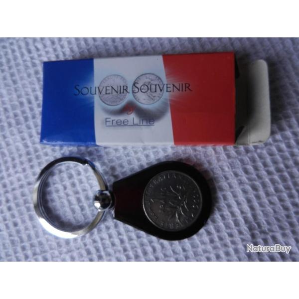 porte cl�s Souvenir Souvenir By Free Line avec une ancienne pi�ce de 1 franc