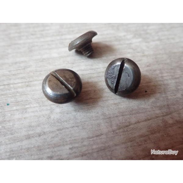 Vis de maintien de plaquettes de pistolet parabellum suisse ?..