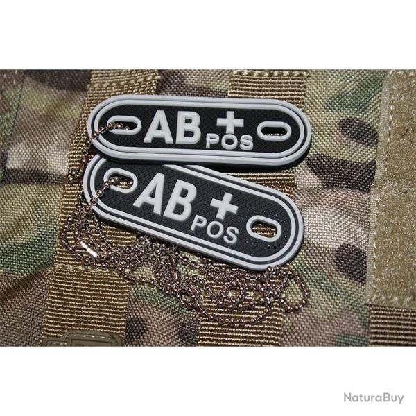 Patch AB+ tour de cou 70 X 25 mm Gomme 3D noir