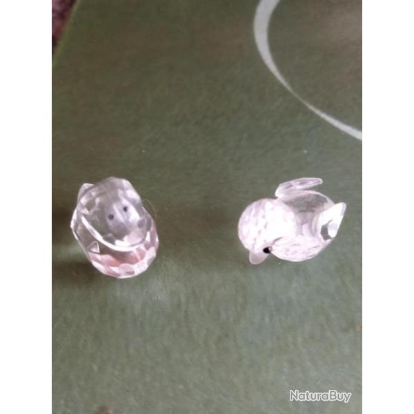 Un poussin en cristal et un canard