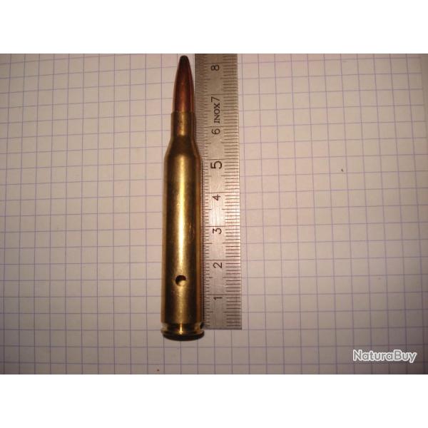 une cartouche de 25.06 remington neutralis�e, amorce percut�e, �tui perc�, pour collection