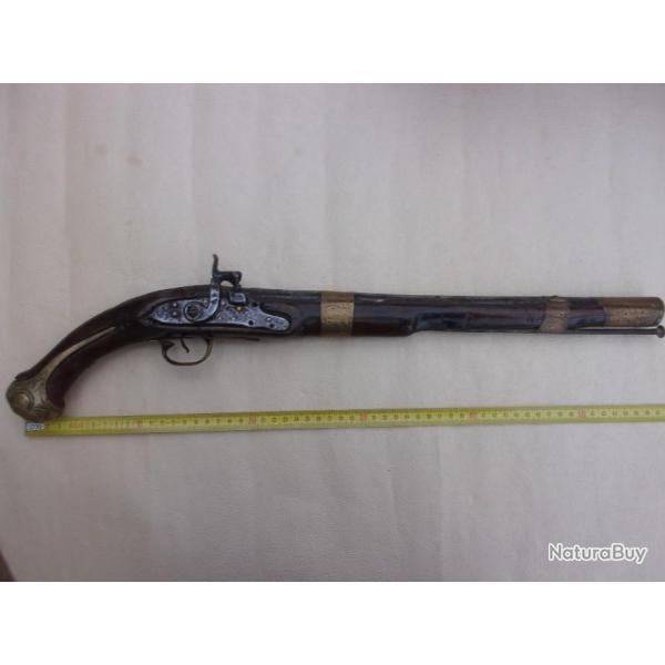 Pistolet � silex. 18 �me.