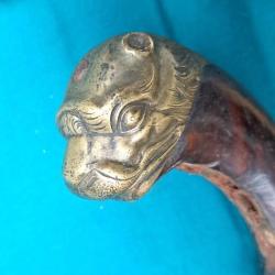 ..PISTOLET A TETE DE LION DE MER PRE 18&egrave;m A RESTAUR&Eacute; ......