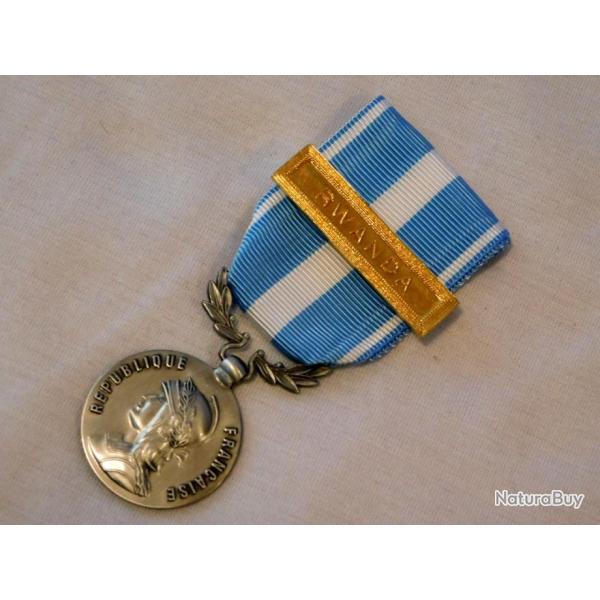 MEDAILLE OUTRE MER + BARETTE RWANDA     ...  �tat 100% neuf