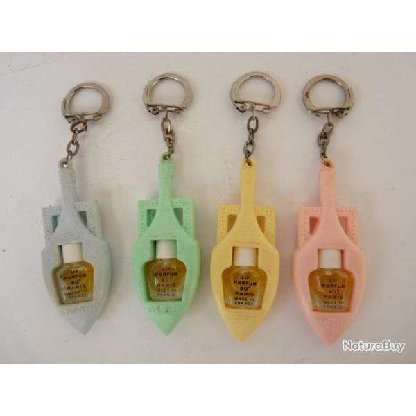 Quatre Flacons de parfum LIF 80� Paris Porte Clefs