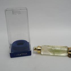 Flacon d'eau de toilette KISS & TELL