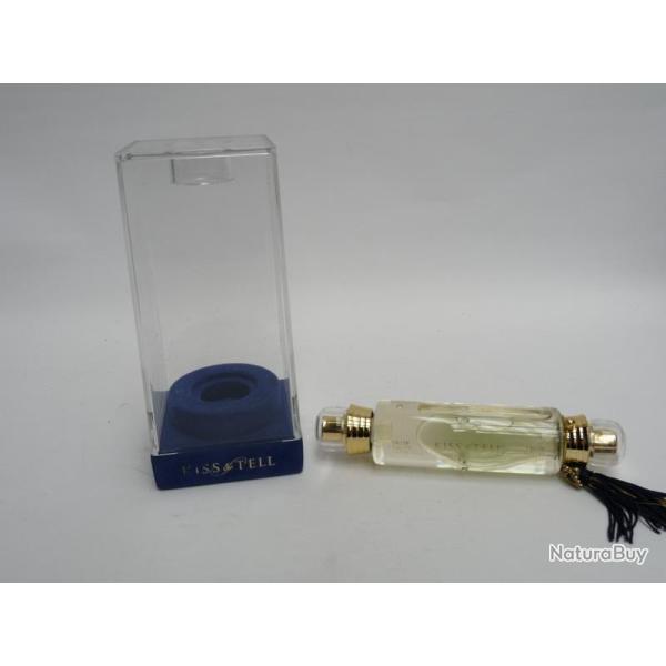 Flacon d'eau de toilette KISS & TELL