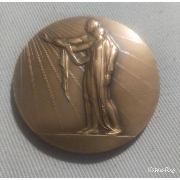 M�daille de table - bronze - homme femme ensemble.