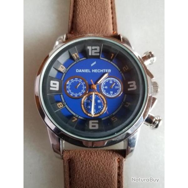 Montre homme �" petit prix "Daniel Hechter ( neuf de stock pile neuve)