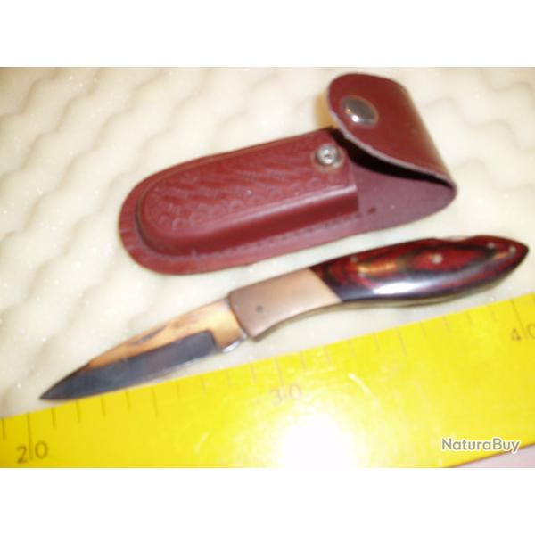 1 COUTEAU de CHASSE  de poche ou de table "avec son ETUI  ".