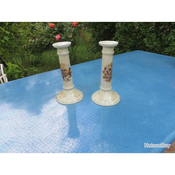 Paire de bougeoirs en porcelaine de Sologne motifs oiseaux