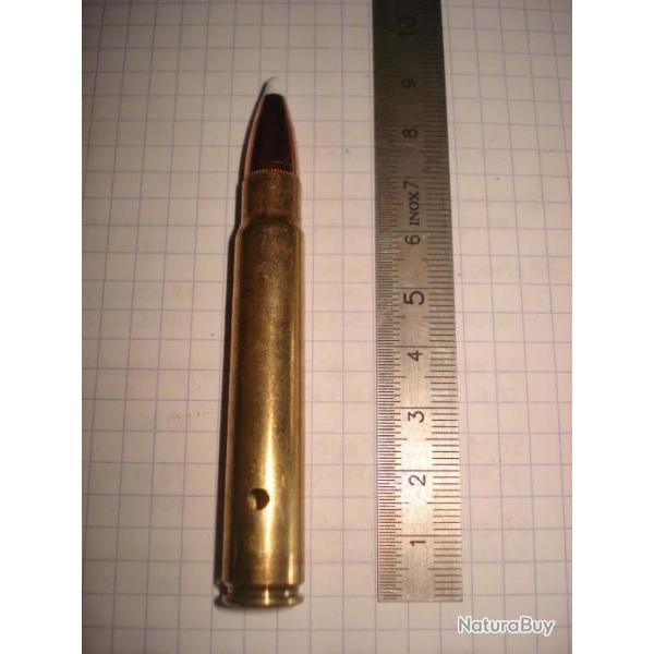 une cartouche de 9,3x66 sako neutralis�e, amorce percut�e, �tui perc�, pour collection