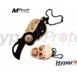 Couteau pliant manche en t&ecirc;te de mort