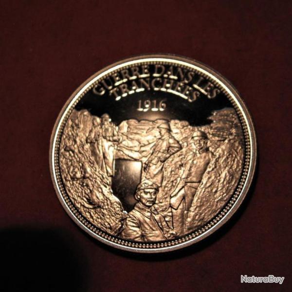 medaille guerre dans les tranch�es1916 diametre 40 mm pds 31 grs