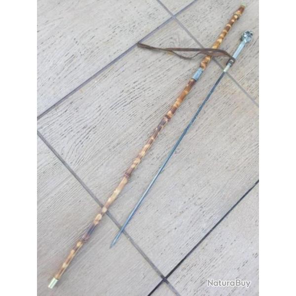 ANCIENNE CANNE  EPEE  BAMBOU  A CASQUE EMPANACHE  .  BEL  ETAT   .....  PETIT  PRIX ......