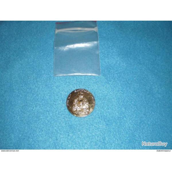 M�daillon de crosse R.C.M.P. pour comm�moratives "Origine WINCHESTER" Collection !