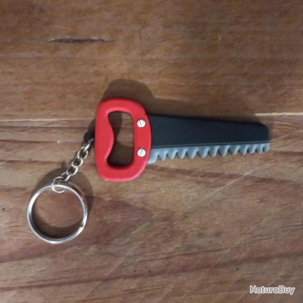 PORTE CL�  � LA FORME DE  SCIE