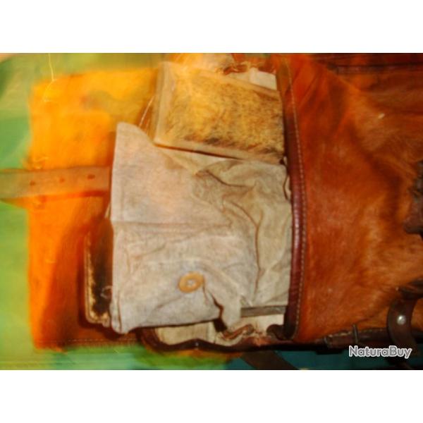 SAC A DOS SUISSE EN POIL DE VACHE AVEC GARNITURE