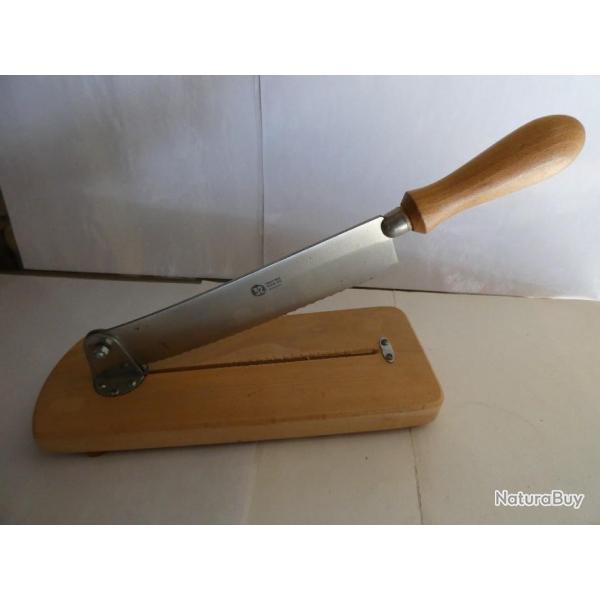 Vends 1 coupe-pain  marque  32 Dumas