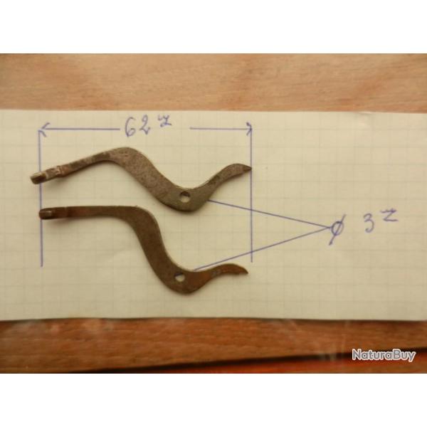 lot de deux pi�ces d�tach�es pour arme.