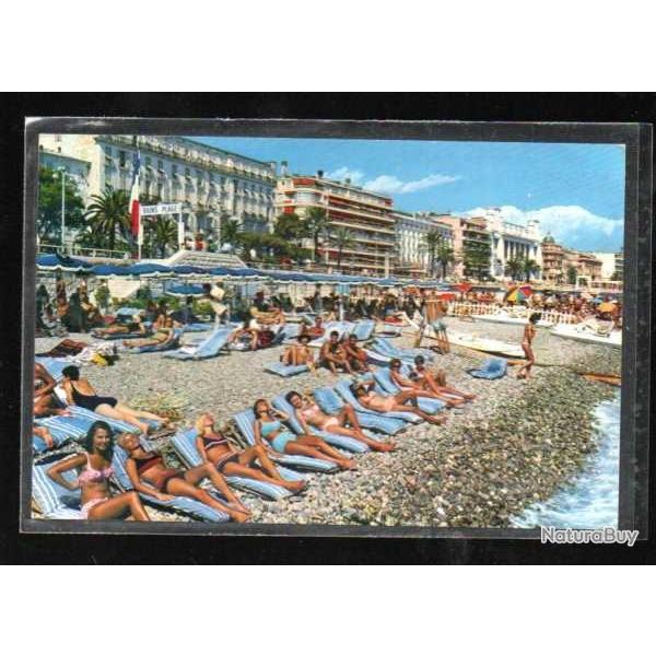 nice la plage et la promenade des anglais , exposition de viande sur la plage de galets ! carte post