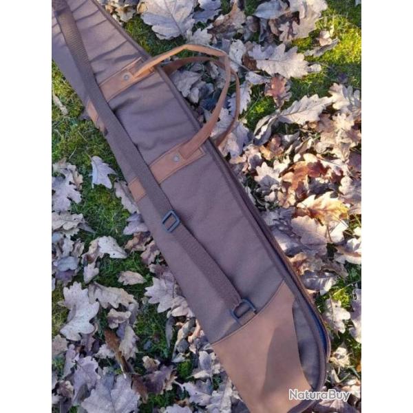 Fourreau luxe cuir et toile.