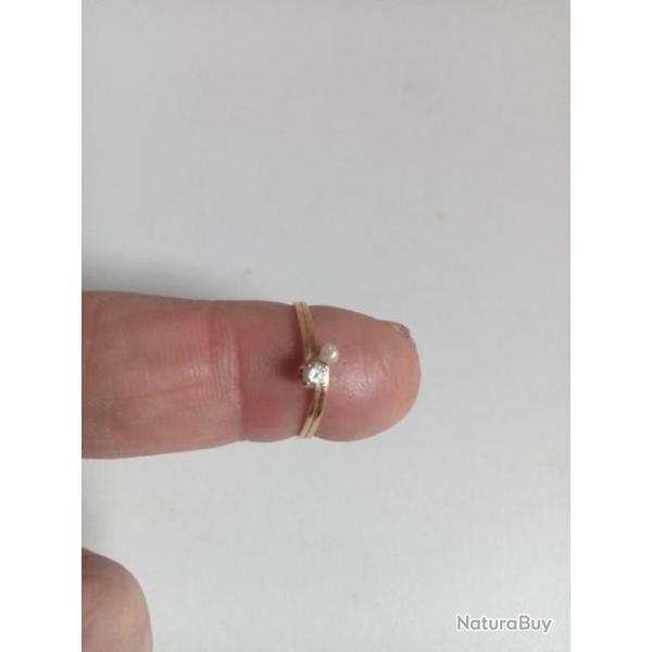 bague or 18 carats avec diamant et perle diam�tre 16 mm interieur