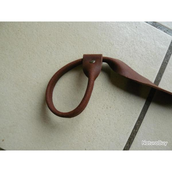Une Bretelle lasso en cuir ...